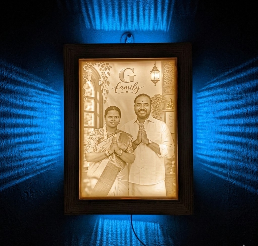 Lithophane night light glowing with warm light showing a detailed photo print